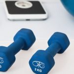 Home Fitness - Two 2 Kg. Blue Hex Dumbbells on White Surface
