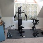 Home Workouts - black and gray exercise equipment