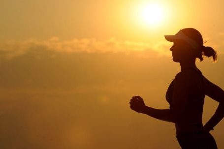 Boost Endurance - Woman With White Sunvisor Running