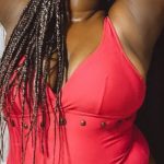 Transformation, Weight Loss - Large black woman in swimsuit laughing brightly