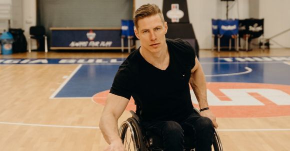 Sports Training - Man Playing Basketball while Sitting on a Wheelchair