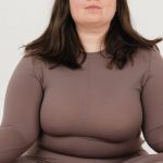 Energy Boost, Mental Clarity - Serene plus size female meditating in Lotus pose