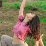 Fit On Programs - Woman Practicing Yoga in Forest