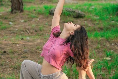 Fit On Programs - Woman Practicing Yoga in Forest