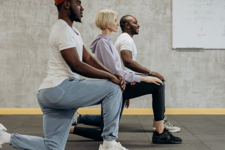 Cardio Balance - Three People In A Kneeling Position