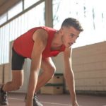 Cardio Fitness. - Man In Red Tank Top Is About To Run