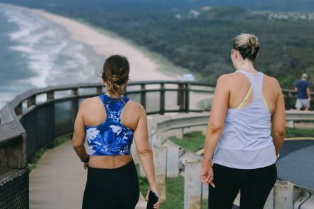 Joint-friendly Workouts - 2 Women Walking Down the Path