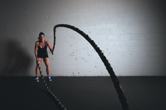 Cardio Exercises - woman holding brown ropes