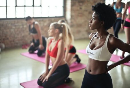 Cardio Exercises - woman wearing sport bra standing on gym floors