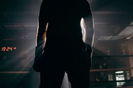 Sports-specific Training - Man in Black Shirt and Pants Standing on the Floor