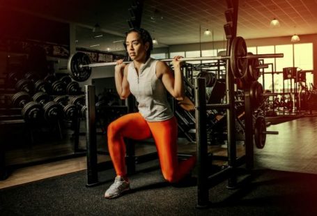 Cardio Exercises - woman wearing gray shirt and orange leggings