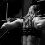 Sport Training - woman lifting barbell