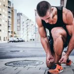 Cardio Exercises - man tying his shoes