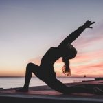Cardio Exercises - silhouette photography of woman doing yoga