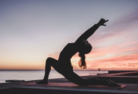 Cardio Exercises - silhouette photography of woman doing yoga