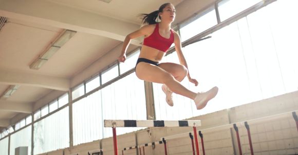Agility Training. - Photo of a Woman Jumped on Obstacle