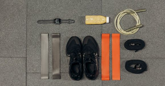 Weight Loss Programs - Exercise Tools On Gray Surface