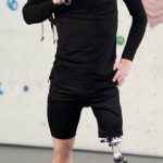 Fit Challenge - Man in Black Long Sleeve Shirt and Black Shorts Standing With Prosthetic Leg