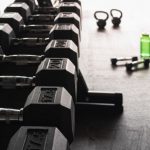 Strength Training - black and gray dumbbells on floor